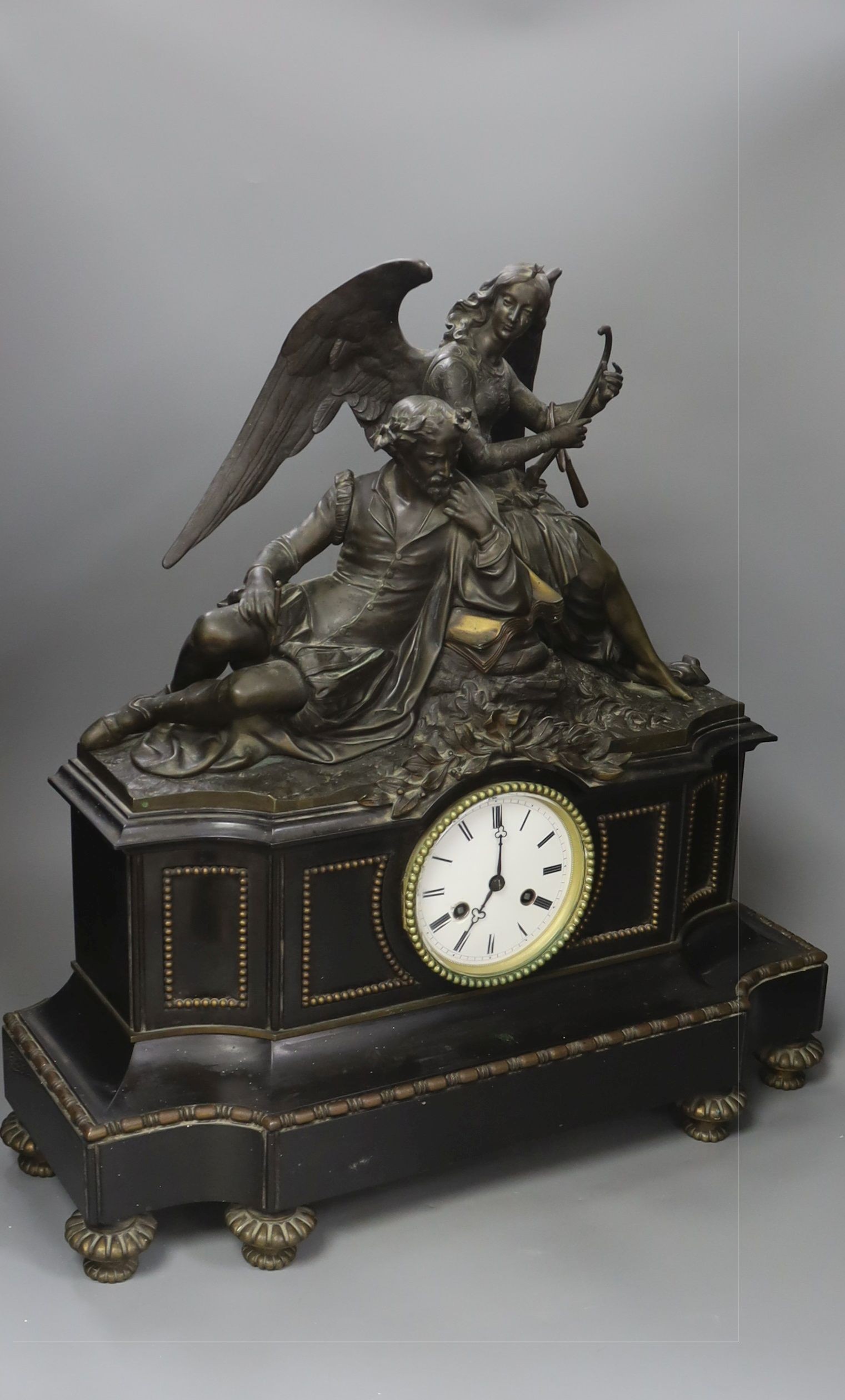 A large 19th century French bronze and black slate mantel clock 52cm